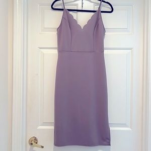 Beautiful scalloped purple wedding guest dress